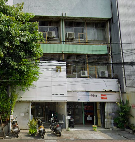 Close-up of a piano with the brand name 'Harrodser' on it